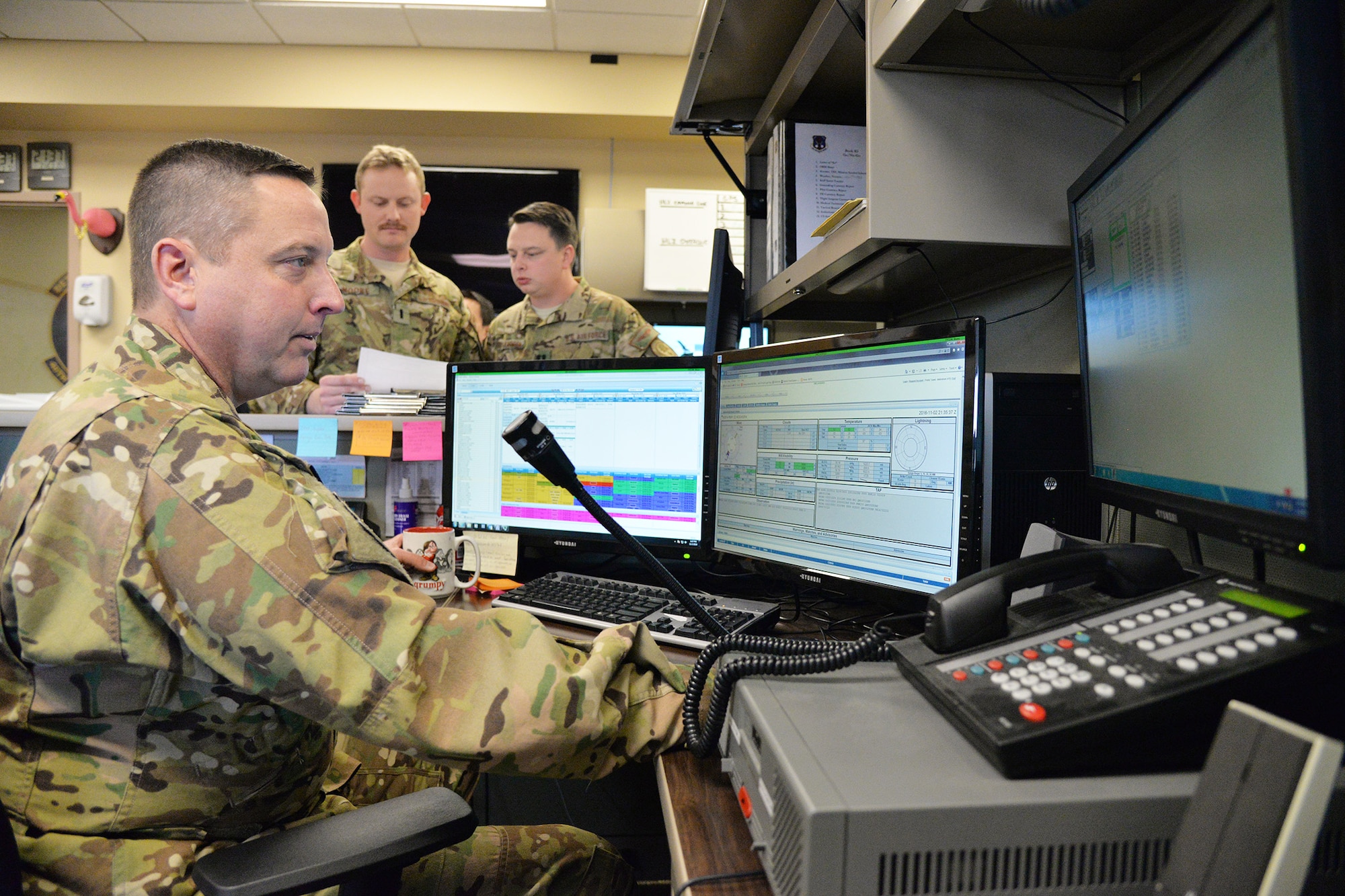 Lt. Col. Kurt Geisen, 40th Helicopter Squadron assistant director of operations, monitors pertinent flying information on a computer Nov. 2, 2016, at Malmstrom Air Force Base, Mont. The 40th HS trains for search and rescue missions in addition to the security mission they support here at the 341st Missile Wing. (U.S. Air Force photo/Airman 1st Class Daniel Brosam)