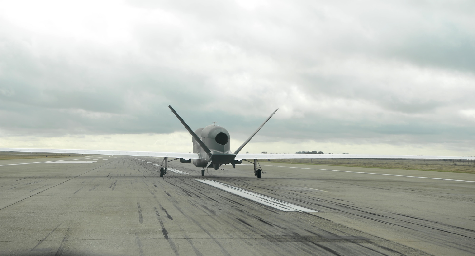 A RQ-4 Global Hawk motors down the runway Nov. 1, 2016, at Beale Air Force Base, California. The RQ-4 Global Hawk is a high-altitude, intelligence, surveillance and reconnaissance, long-endurance, remotely piloted aircraft. (U.S. Air Force photo/Staff Sgt. Bobby Cummings)