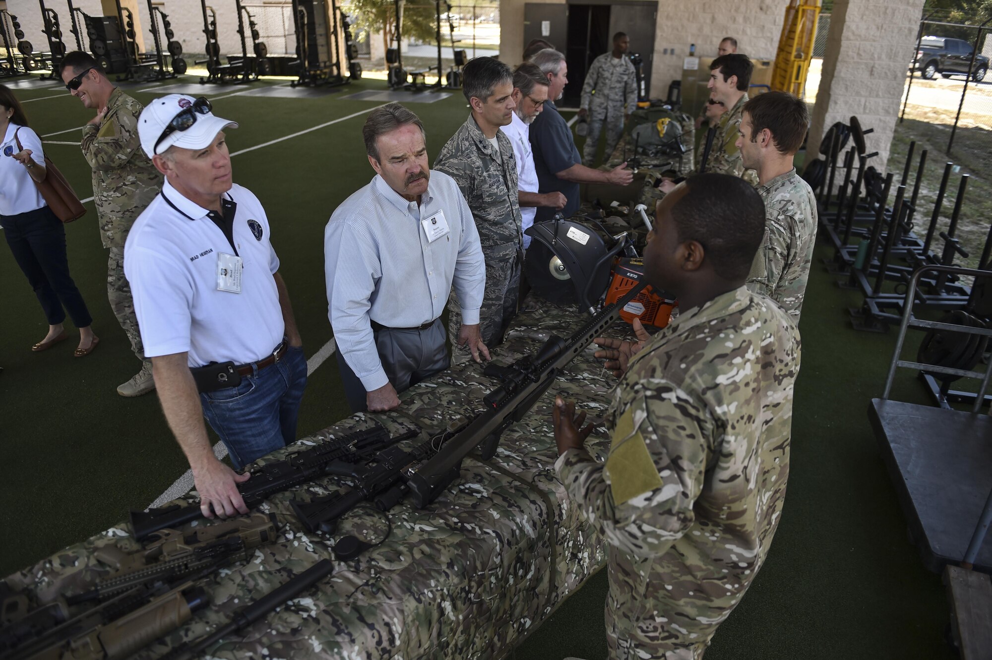 Civic leaders speak to Special Tactics Airmen about various types of equipment used on the battlefield during the Chief of Staff of the Air Force Civic Leader Tour at Hurlburt Field, Fla., Nov. 2, 2016. A group of CSAF civic leaders were given a hands-on tour of Special Tactics capabilities and offered a unique perspective of the Air Force’s ground operators through several operational demonstrations.  (U.S. Air Force photo by Senior Airman Ryan Conroy)