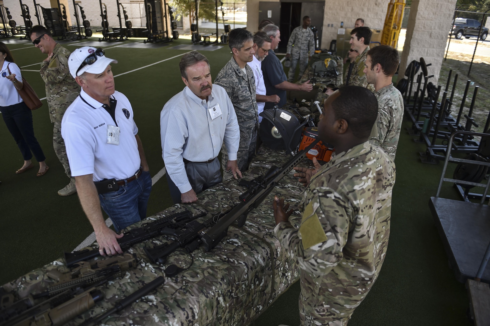 Civic leaders speak to Special Tactics Airmen about various types of equipment used on the battlefield during the Chief of Staff of the Air Force Civic Leader Tour at Hurlburt Field, Fla., Nov. 2, 2016. A group of CSAF civic leaders were given a hands-on tour of Special Tactics capabilities and offered a unique perspective of the Air Force’s ground operators through several operational demonstrations.  (U.S. Air Force photo by Senior Airman Ryan Conroy)