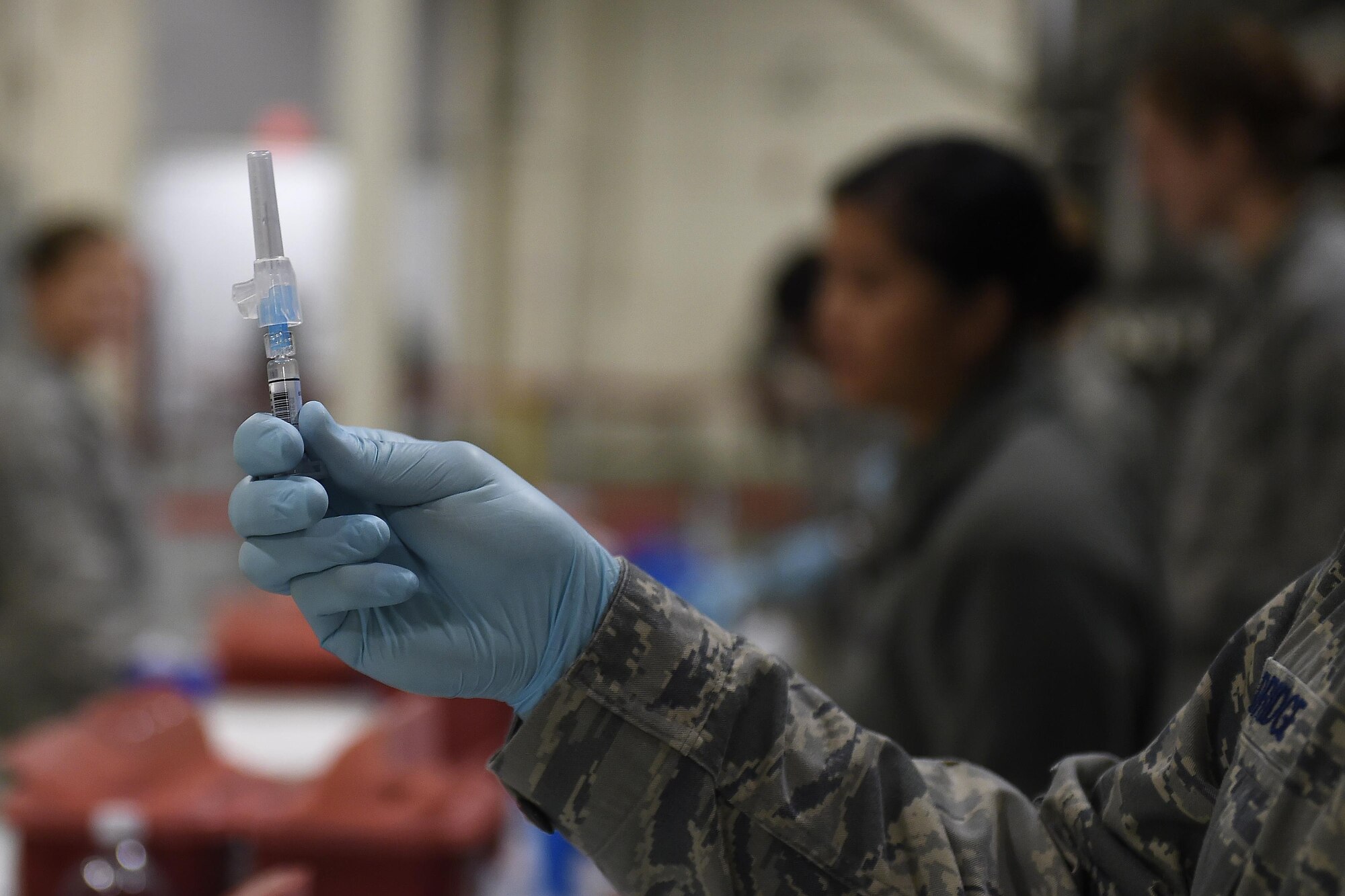 Annual flu shots are administered to Team McChord Airmen Oct. 28, 2016, at Joint Base Lewis-McChord, Wash. More than 1,200 Airmen received the vaccine during a mass vacation exercise. (U.S. Air Force photo\ Tech. Sgt. Tim Chacon)