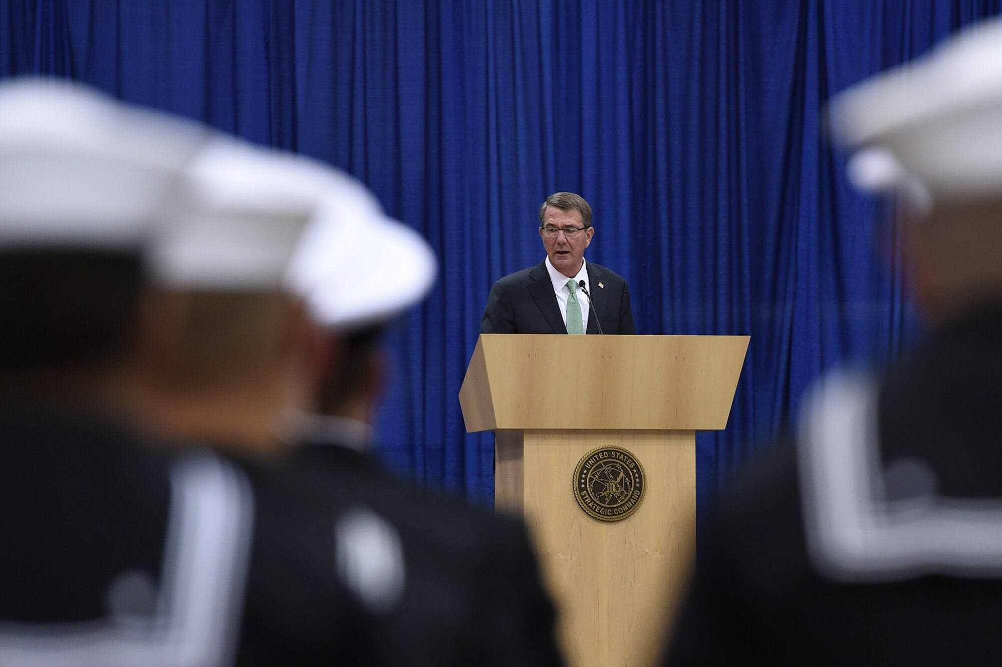Secretary of Defense Ash Carter provides remarks during the U.S. Strategic Command (USSTRATCOM) change of command ceremony at Offutt Air Force Base, Neb., Nov. 3, 2016. Carter, who presided over the change of command, congratulated Gen. John E. Hyten on his appointment as the new USSTRATCOM commander. He also thanked Adm. Cecil D. Haney, outgoing USSTRATCOM commander, for his service. Additionally, Chairman of the Joint Chiefs of Staff Gen. Joseph F. Dunford provided remarks during the ceremony and presented the Joint Meritorious Unit Award to USSTRATCOM. Hyten previously served as commander of Air Force Space Command, and Haney will retire from active military duty during a separate ceremony in January. One of nine DoD unified combatant commands, USSTRATCOM has global strategic missions assigned through the Unified Command Plan that include strategic deterrence; space operations; cyberspace operations; joint electronic warfare; global strike; missile defense; intelligence, surveillance and reconnaissance; combating weapons of mass destruction; and analysis and targeting. (U.S. Air Force photo by Staff Sgt. Jonathan Lovelady)