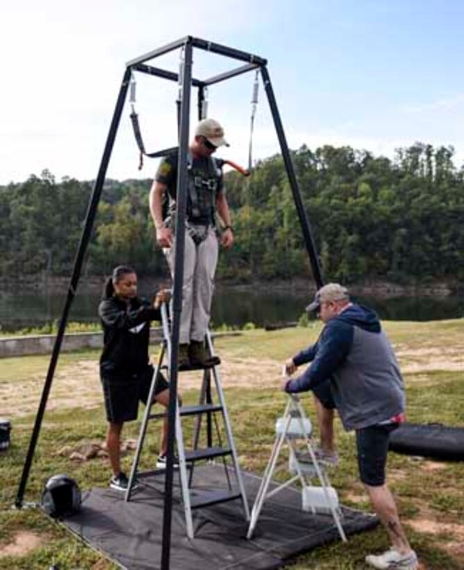 Tech. Sgt. Andrew Stoll, the 189th Operations Support Squadron aircrew flight equipment flight chief, conducts hanging harness training during water survival and flight crew emergency training Oct. 1, 2016, at Lake Ouachita, Arkansas. The two-day training event consisted of aircrew flight equipment training, water survival training and self-aid buddy care. (U.S. Air National Guard photo by Tech. Sgt. Jessica Condit) 