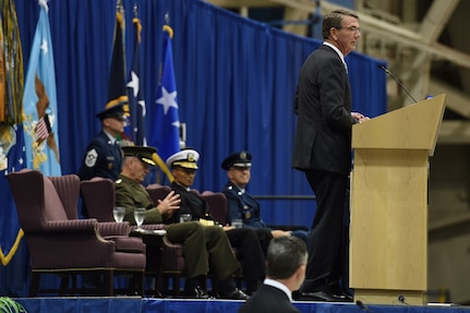 Secretary of Defense Ash Carter (right) provides remarks during the U.S. Strategic Command (USSTRATCOM) change of command ceremony at Offutt Air Force Base, Neb., Nov. 3, 2016. Carter, who presided over the change of command, congratulated Gen. John E. Hyten (seated right) on his appointment as the new USSTRATCOM commander. He also thanked Adm. Cecil D. Haney (seated center), outgoing USSTRATCOM commander, for his service. Additionally, Chairman of the Joint Chiefs of Staff Gen. Joseph F. Dunford (seated left) provided remarks during the ceremony and presented the Joint Meritorious Unit Award to USSTRATCOM. Hyten previously served as commander of Air Force Space Command, and Haney will retire from active military duty during a separate ceremony in January. One of nine DoD unified combatant commands, USSTRATCOM has global strategic missions assigned through the Unified Command Plan that include strategic deterrence; space operations; cyberspace operations; joint electronic warfare; global strike; missile defense; intelligence, surveillance and reconnaissance; combating weapons of mass destruction; and analysis and targeting. (U.S. Air Force photo by Staff Sgt. Jonathan Lovelady)