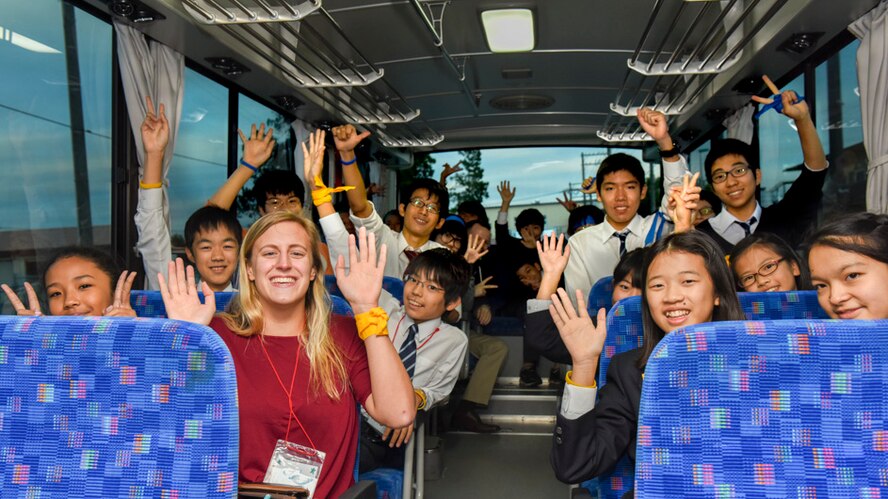 Participants pose for a picture during the Youth International Exchange Fair at Yokota Air Base, Japan, Oct. 29, 2016. Approximately thirty students from Yokota and Tachikawa, Japan participated in the event, included a base tour, a workshop on the United Nation Global Goals for Sustainable Development and trick‐or-treating. (U.S. Air Force photo by Machiko Arita/Released)