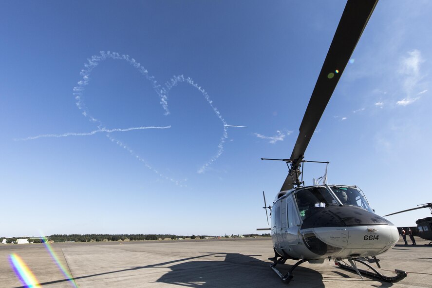The Japan Air Self-Defense Force aerobatic team, Blue Impulse, create a heart in the sky at an annual air show at Iruma Air Base, Japan, Nov. 3, 2016. Blue Impulse used the smoke-trails to create artistic patterns. (U.S. Air Force photo by Yasuo Osakabe/Released) 