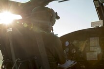 U.S. Air Force Capt. Jonathan Bonilla, 459th Airlift Squadron UH-1N Iroquois pilot, communicates with his crewmembers after participating in an annual air show at Iruma Air Base, Japan, Nov. 3, 2016. More than 130,000 people of all ages attended the show. The Japan Self-Defense Forces showed off a wide range of its finest airplanes including the Blue Impulse JASDF aerobatic demonstration team. Also, a UH-1N and a C-12 Huron assigned to the 459 AS participated in the static display. (U.S. Air Force photo by Yasuo Osakabe/Released)  