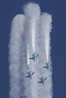 The Japan Air Self-Defense Force aerobatic team, Blue Impulse, fly in formation over Iruma Air Base, Japan, Nov. 3, 2016. Blue Impulse used the smoke-trails to sketch artistic patterns in the sky. (U.S. Air Force photo by Yasuo Osakabe/Released)