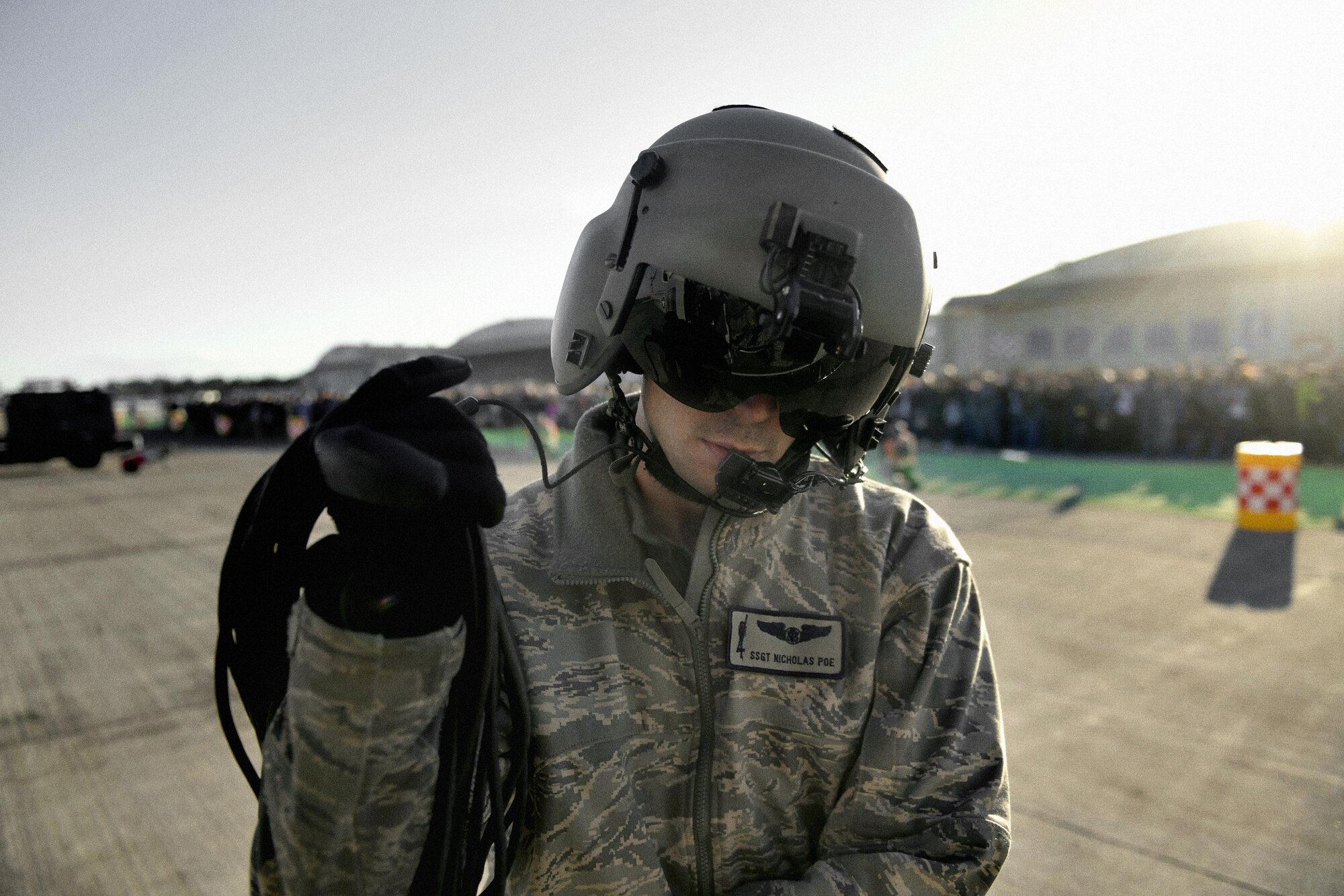 U.S. Air Force Staff Sgt. Nicholas Poe, 459th Airlift Squadron UH-1N Huey flight engineer, prepares for takeoff at Iruma Air Base, Japan, Nov. 3, 2016. This year marked the third time Yokota aircraft were featured in the Iruma Air Show. (U.S. Air Force photo by Senior Airman Delano Scott/Released)