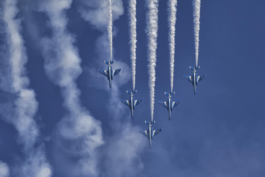 The Japan Air Self-Defense Force aerobatic team, Blue Impulse, fly in formation over Iruma Air Base, Japan, Nov. 3, 2016. Blue Impulse used the smoke-trails to sketch artistic patterns in the sky. (U.S. Air Force photo by Senior Airman Delano Scott/Released)