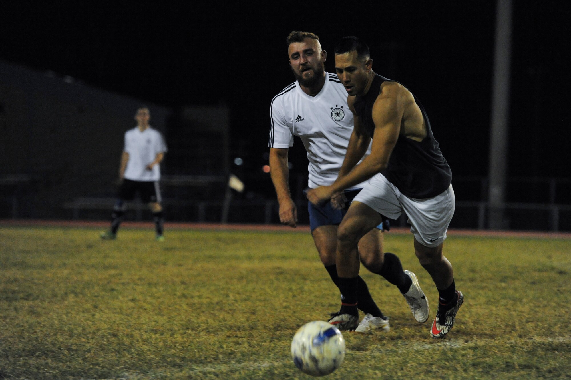 Members of the 39th LRS and NATO intramural soccer teams battle for a ball Nov. 1, 2016, at Incirlik Air Base, Turkey. The championship game was decided in the shootout, where the LRS team lost to the NATO team 3-5. (U.S. Air Force photo by Airman 1st Class Devin M. Rumbaugh)