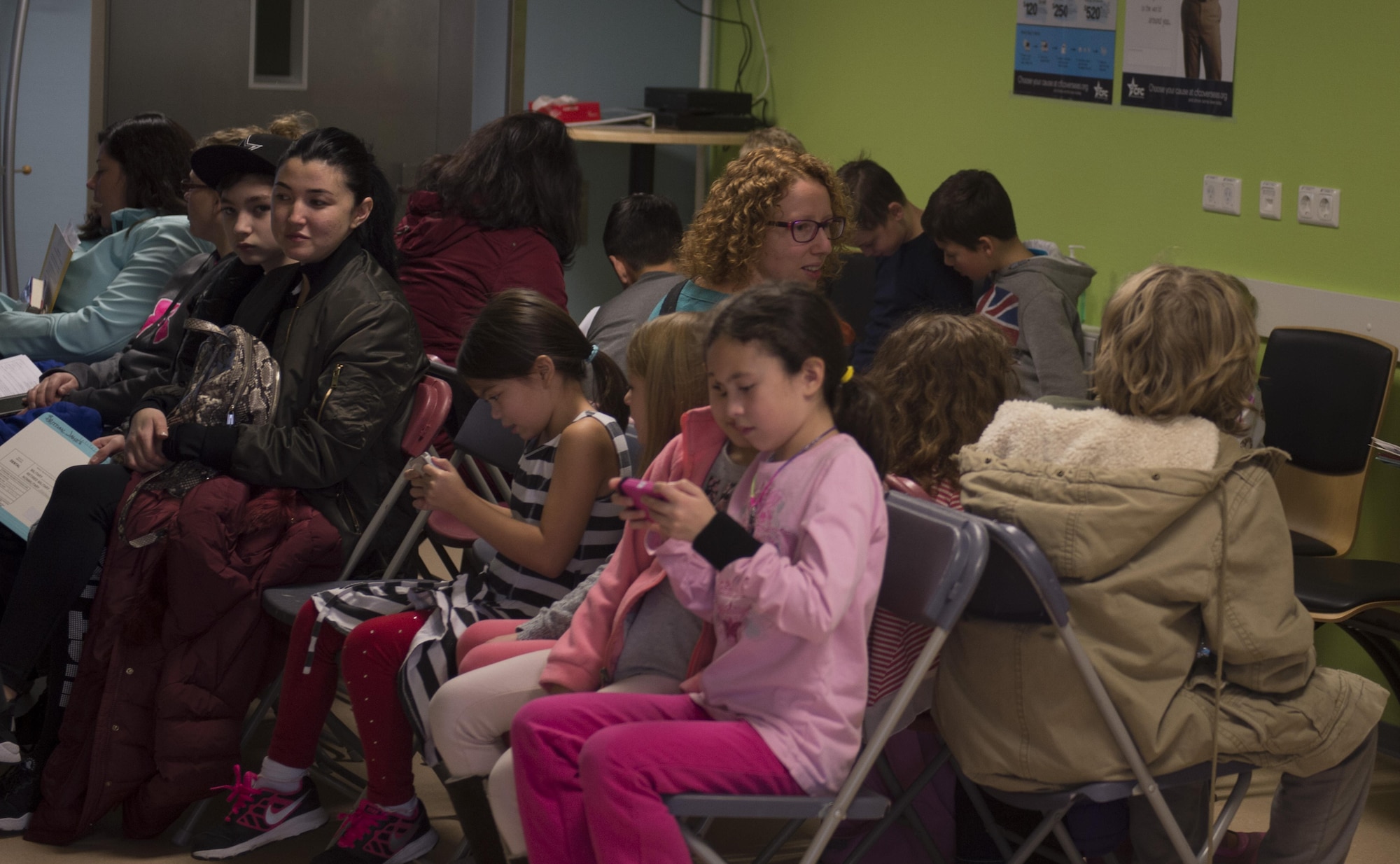 Family members of the 52nd Fighter Wing wait in the 52nd Dental Squadron’s lobby during the semi-annual walk-in kiddie clinic at Spangdahlem Air Base, Germany, Nov. 4, 2016. The clinic offers routine cleanings and checkups for children up to the age of 13. (U.S. Air Force photo by Senior Airman Dawn M. Weber)