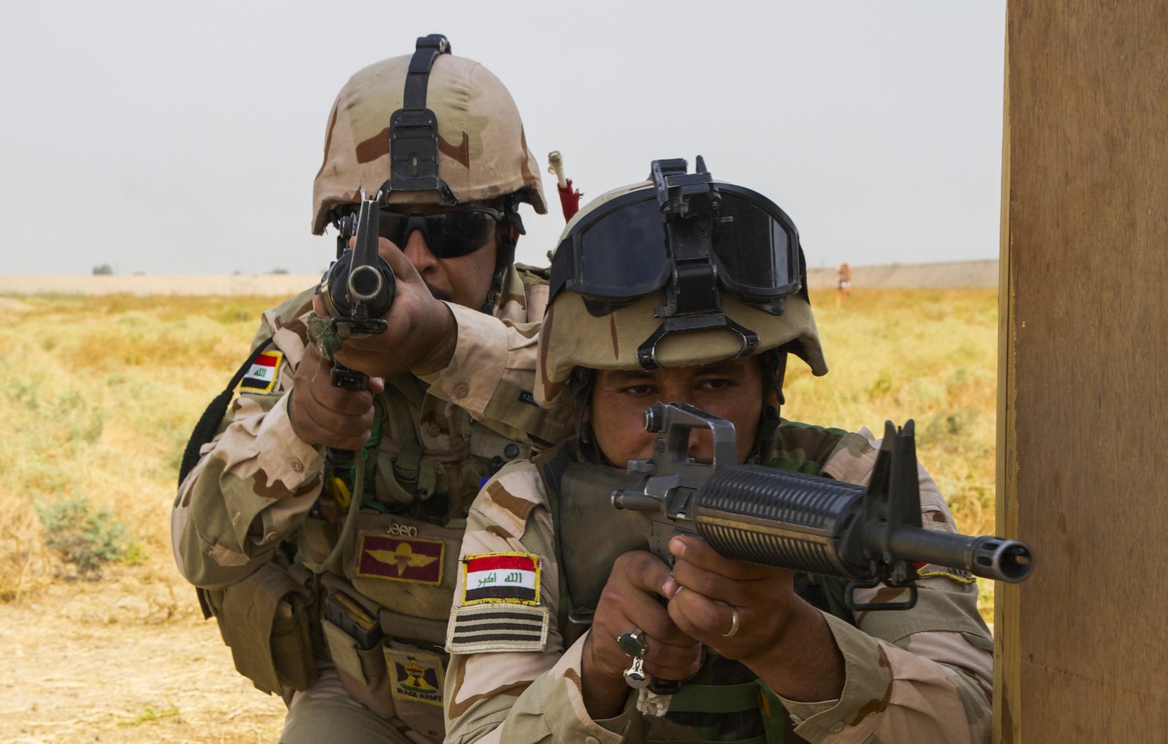 Iraqi soldiers attending Iraqi Noncommissioned Officer Academy clear a corner during urban-combat training at Camp Taji, Iraq, Oct. 22, 2016. This training is critical to enabling the Iraqi security forces to counter ISIL as they work to regain territory from the terrorist group. (U.S. Army photo by Spc. Craig Jensen)