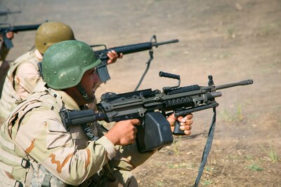 Peshmerga soldiers practice providing security during the Modern Brigade Course culmination exercise near Atrush, Iraq, Oct. 12, 2016. The exercise incorporated advanced infantry battle drills and maneuver tactics during realistic combat scenarios. Training at building partner capacity sites is an integral part of Combined Joint Task Force – Operation Inherent Resolve’s multinational effort to train Peshmerga security forces personnel to defeat the Islamic State of Iraq and the Levant. (U.S. Army photo by Sgt. Lisa Soy)