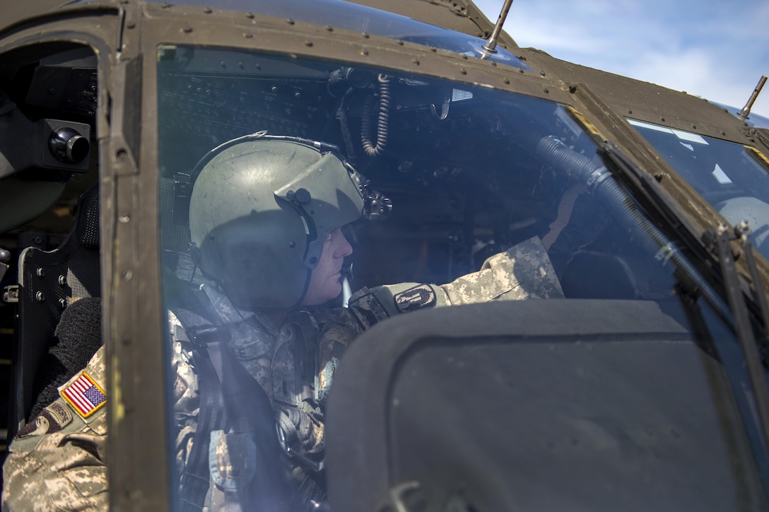 Army Chief Warrant Officer Clayton Pickle performs pre-flight checks on his UH-60 Black Hawk helicopter before taking off on a mission during Southern Strike 17 at the Gulfport Combat Readiness Training Center, Miss., Oct. 26, 2017. Pickle is a pilot assigned to the Mississippi Army National Guard’s Golf Company, 1st Battalion, 168th Aviation Regiment. Southern Strike 17 is a total force, multi-service training exercise hosted by the Mississippi Air National Guard’s Combat Readiness Training Center in Gulfport, Miss., from Oct. 24 through Nov. 4, 2016. The exercise emphasizes air-to-air, air-to-ground and special operations forces training opportunities. Air Force photo by Airman 1st Class Sean Carnes
