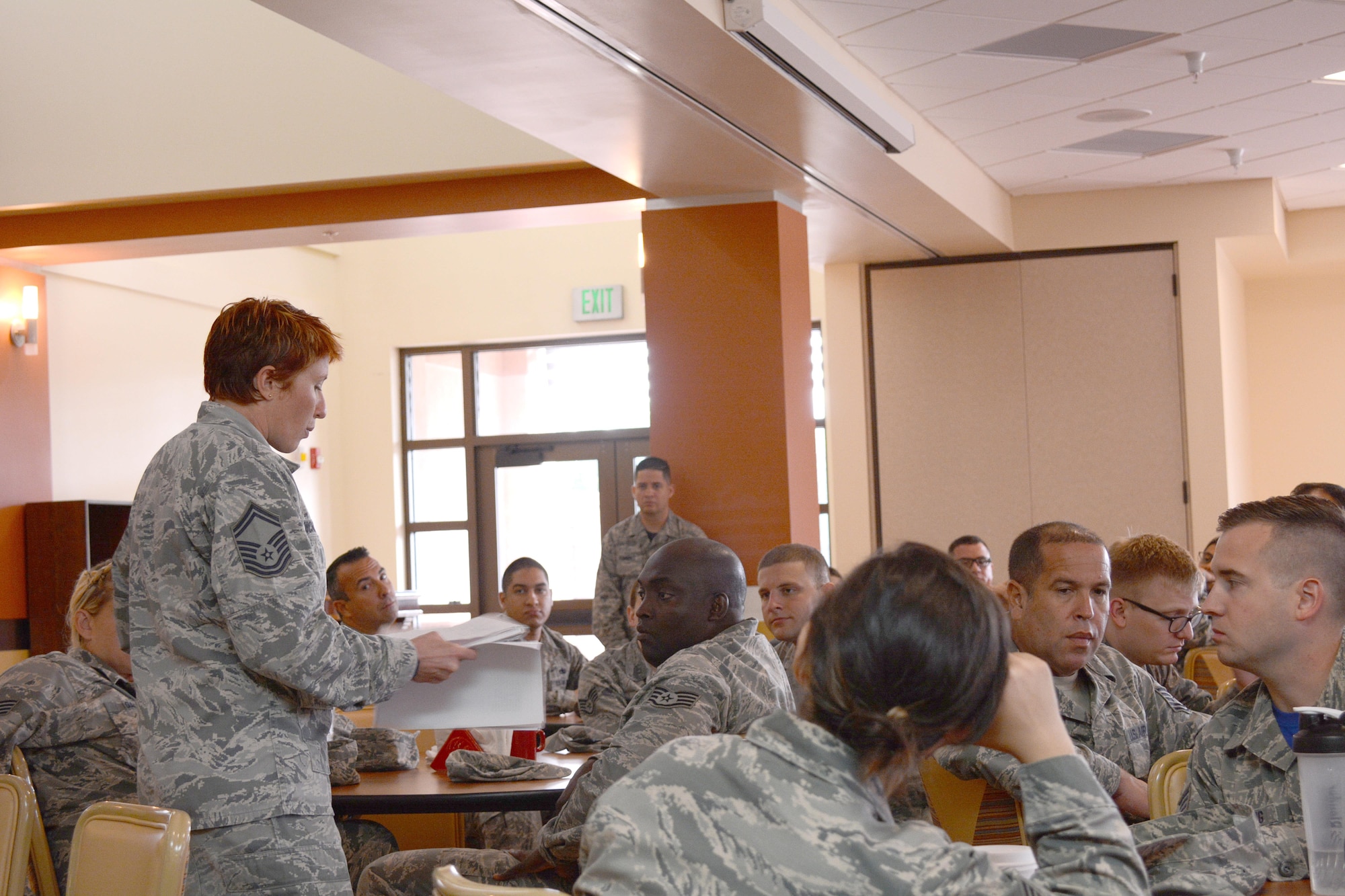 Senior Master Sgt. Jenny Nicholson, the 482nd Civil Engineering fire fighter, speaks to NCOs about 5/6 Club opportunities, here, Oct. 16, 2016. During the October Unit Training Assembly, Chief Master Sgt. Frederick Becking, the 482nd Fighter Wing command chief, held the first Airman and junior NCO all call to encourage unity and inform personnel of the revitalization to the Airman’s Council and 5/6 Club. (U.S. Air Force photo by Staff Sgt. Desiree W. Moye)