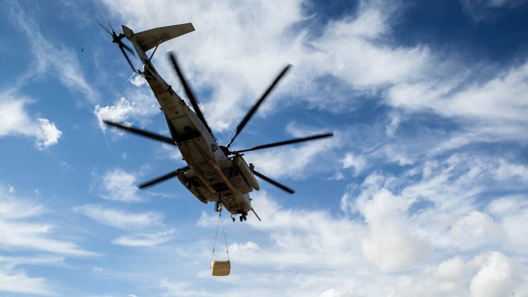A CH-53E Super Stallion, with Marine Heavy Helicopter Squadron 466, transports a 500-gallon drum of water to Marines who are conducting field operations in the Sierra Mesa Mountains, California, Oct. 25, 2016. The drum supported Marines who were participating during Mountain Exercise 6-16. 