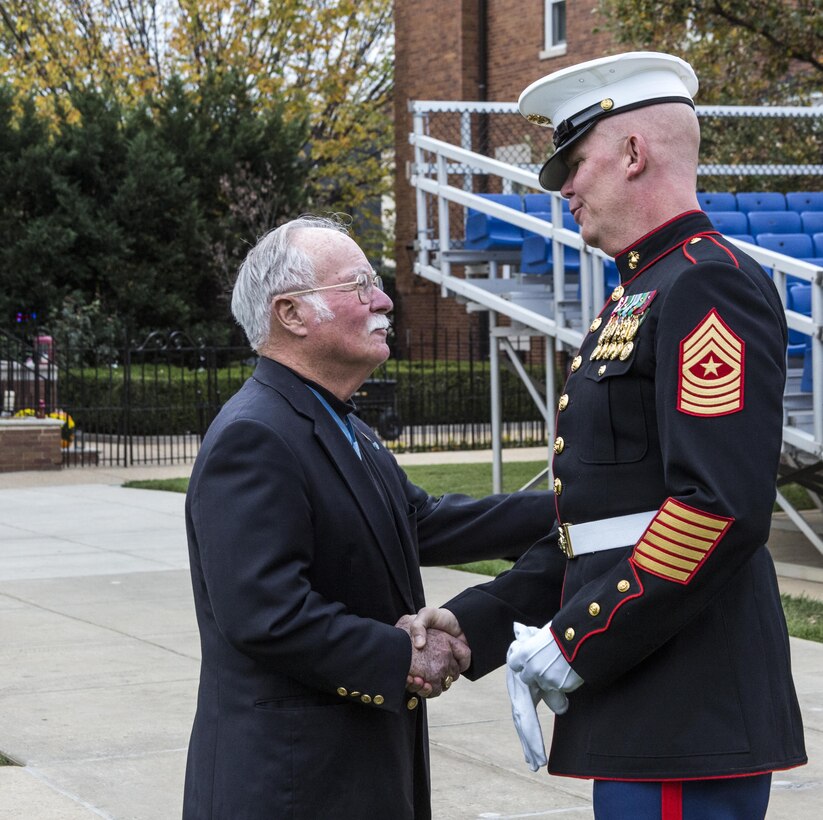 Medal of Honor recipient, retired Col. Harvey C. Barnum, greets Sgt. Maj. Joseph C. Gray, Marine Barracks Washington, D.C. sergeant major, during the Tun Tavern II event at Marine Barracks Washington, D.C, Nov. 1, 2016. Tun Tavern II is a celebration of the Marine Corps' birthday hosted for active and retired FBI Agents each year, all of whom are retired Marines. (Official Marine Corps photo by Lance Cpl. Robert Knapp/Released)