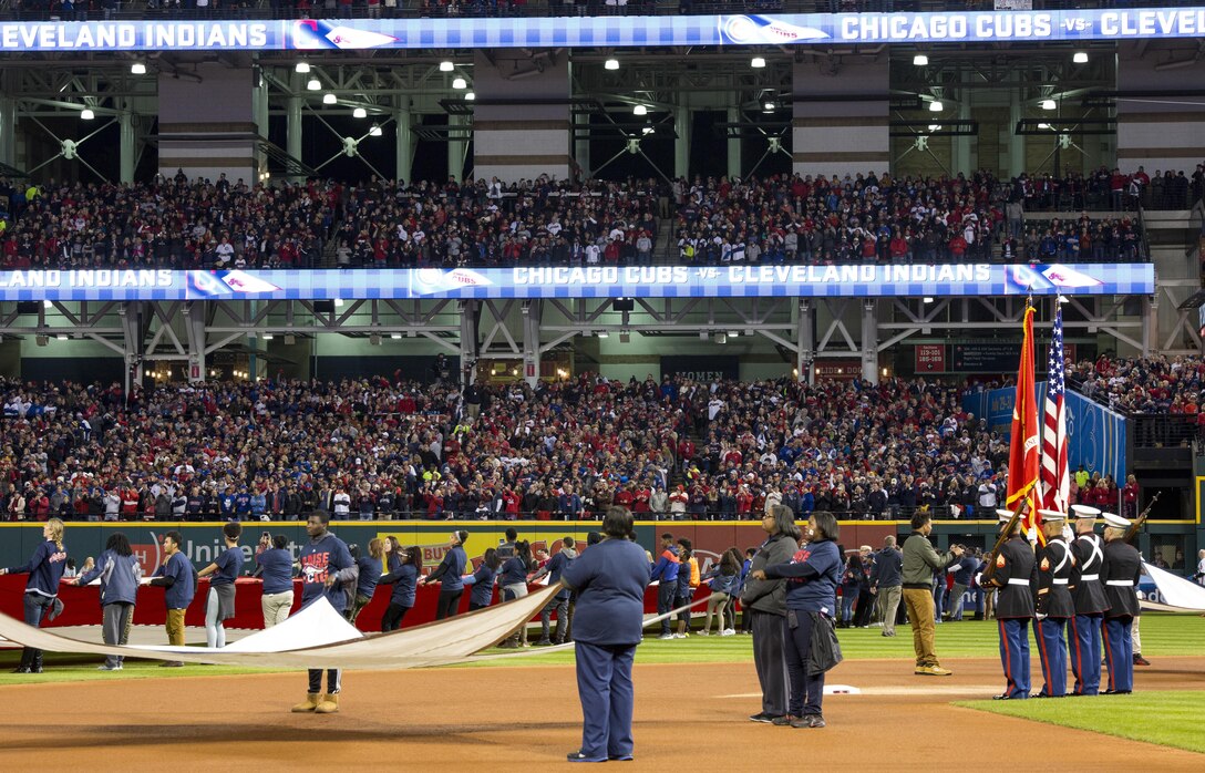 Marines from 3rd Battalion, 25th Marine Regiment, 4th Marine Division, participated in a Color Guard ceremony at game one of the 2016 World Series at Progressive Field in Cleveland, Oct. 25, 2016. Just before the ceremony, announcer Bob Tyek gave credit to the Marine Corps Reserve and its 100 years of faithful service. Today, approximately 500 Reserve Marines are providing fully integrate global operational support to the Fleet and Combatant Commanders. For more information on the history and heritage of the Marine Corps Reserve as well as current Marine stories and upcoming Centennial events, please visit www.marines.mil/usmcr100. (U.S. Marine Corps photo by Lance Cpl. Dallas Johnson)