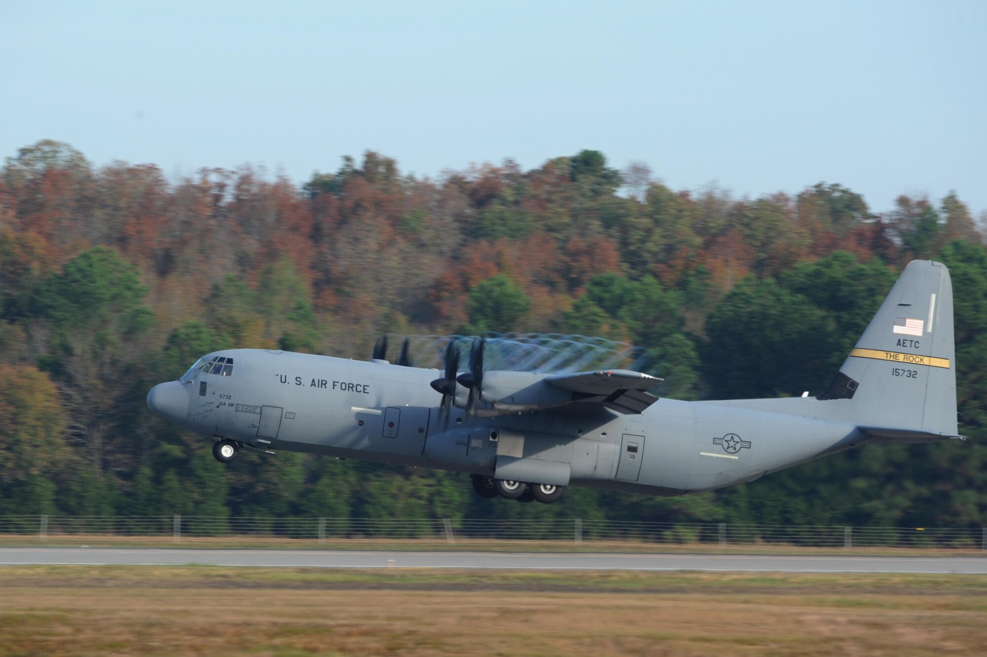 A C-130J takes off from the flightline during an 11-ship C-130J formation Oct. 24, 2016, at Little Rock Air Force Base, Ark. The aircraft is capable of operating from rough dirt-strips and is the primary transport for airdropping troops and equipment into hostile areas. (U.S. Air Force photo by Airman Grace Nichols)