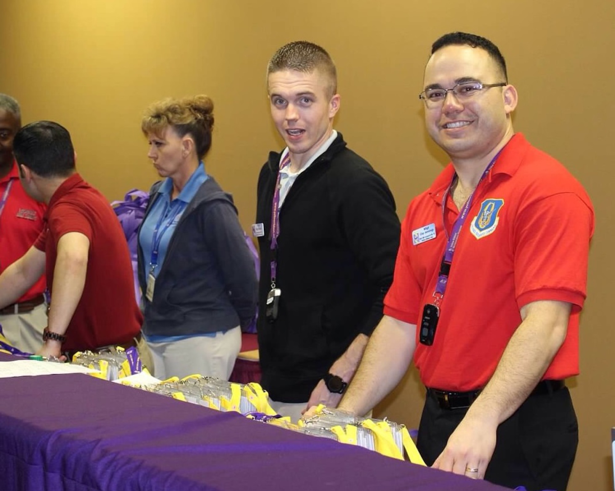 Tech Sgt. Ray Wahl (left) and Master Sgt. Clay Jennings help register participants at an Air Force Reserve Yellow Ribbon Reintegration Program training event Dec. 18, 2015, in Florida. Wahl is a Yellow Ribbon representative with the 931st Air Refueling Group at McConnell Air Force Base, 
Kansas, while Jennings fills the same role for the 301st Fighter Wing at Naval Air Station Forth Worth Joint Reserve Base, Texas.(U.S. Air Force photo by Staff Sgt. Jaimi Upthegrove)


