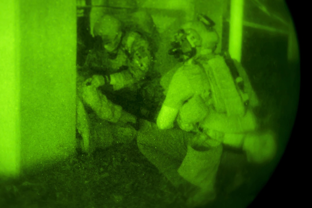 As seen through a night-vision device, Army Special Forces soldiers participate in a night infiltration and exfiltration exercise during Southern Strike 17 at the Gulfport Combat Readiness Training Center, Miss., Oct. 26, 2016. Southern Strike 17 is a total force, multi-service training exercise hosted by the Mississippi Air National Guard’s Combat Readiness Training Center in Gulfport, Miss., from Oct. 24 through Nov. 4, 2016. The exercise emphasizes air-to-air, air-to-ground and special operations forces training opportunities. Air Force photo by Senior Airman Trevor T. McBride