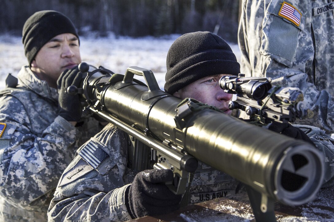 Army Staff Sgt. Justin Heptas, right, and Spc. Anthony Alfaro calibrate a Carl Gustaf recoilless rifle during live-fire training at Joint Base Elmendorf-Richardson, Alaska, Nov. 1, 2016. Heptas and Alfaro are assigned to the 25th Infantry Division’s Company B, 3rd Battalion, 509th Parachute Infantry Regiment, 4th Infantry Brigade Combat Team (Airborne), Alaska. Air Force photo by Alejandro Pena