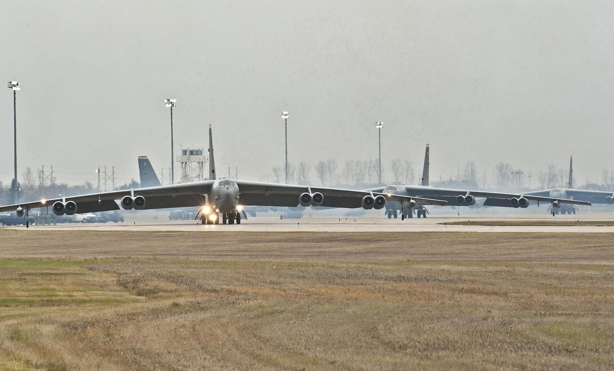 B-52H Stratofortresses assigned to Air Force Global Strike Command (AFGSC) prepare to take off from the runway at Minot Air Force Base, N.D., Oct. 30, 2016, during exercise Global Thunder 17. AFGSC supports U.S. Strategic Command's (USSTRATCOM) global strike and nuclear deterrence missions by providing strategic assets, including bombers like the B-52 and B-2, to ensure a safe, secure, effective and ready deterrent force. Global Thunder is an annual training event that assesses command and control functionality in all USSTRATCOM mission areas and affords component commands a venue to evaluate their joint operational readiness. (U.S. Air Force photo by Airman 1st Class Jonathan McElderry)