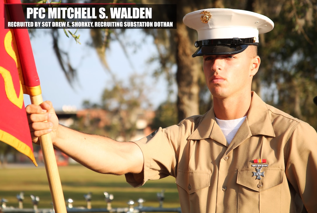 Private First Class Mitchell S. Walden, honor graduate of platoon 2081, holds his guidon at parade rest before graduation Nov. 4, 2016, aboard Marine Corps Recruit Depot Parris Island, South Carolina.  Walden was recruited out of Recruiting Substation  Dothan by Sgt. Drew E. Shorkey. (Official Marine Corps photo by Cpl. Diamond N. Peden/Released)
