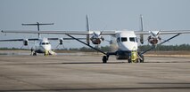 A C-145A Skytruck and a C-146A Wolfhound sit on the flightline waiting for their next mission at Duke Field, Fla.  The two planes are the primary aircraft of the 919th Special Operations Wing. (U.S. Air Force photo/Tech. Sgt. Sam King)  