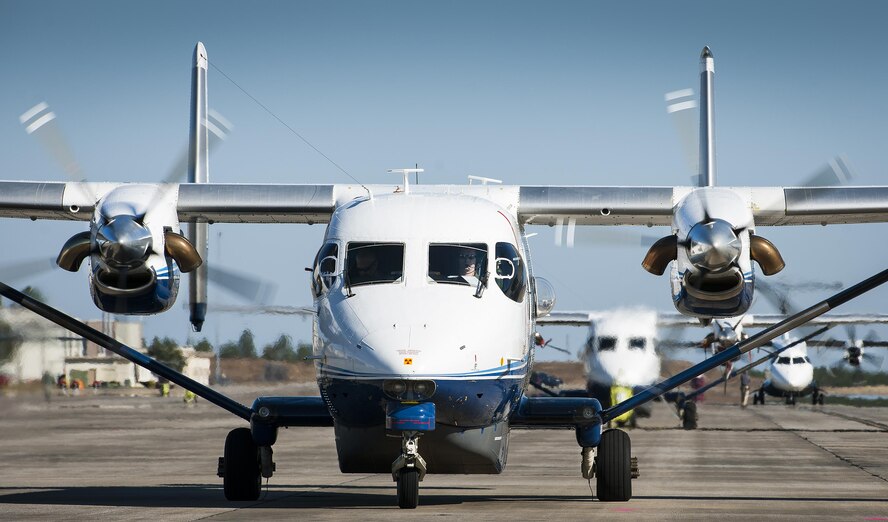 An aircrew prepares for a mission in a C-145A Skytruck at Duke Field, Fla.  The 919th Special Operations Wing is the only wing in the Air Force that flies and maintains the Skytruck.  They are primarily used for new aircrew qualifications and flight proficiency missions.  (U.S. Air Force photo/Tech. Sgt. Sam King)  