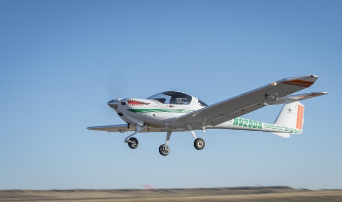 U. S. Air Force Master Sgt. Mike, a student in the Enlisted Pilot Initial Class, takes off in a DA-20 Katana to become the first enlisted Airmen in six decades to complete solo flights during Initial Flight Training at Pueblo Memorial Airport, Pueblo, Colorado, Nov. 3, 2016. The Air Force announced on Dec. 17, 2015, the initiative to train enlisted RPA pilots for RQ-4 Global Hawk flying operations.  (U.S. Air Force photo by Staff Sgt. Cory D. Payne/Released)









