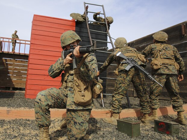 Private First Class Richard A. Lesollen, Hotel Company, 2nd Recruit Training Battalion, provides security while recruits traverse an obstacle during the Crucible at Marine Corps Base Camp Pendleton, Calif. He spent an extra ten months aboard the depot while recovering from a knee injury. Following recruit training, Lesollen will report to the School of Infantry at Camp Pendleton, Calif., and then to the Infantry Training Battalion to become an infantryman.