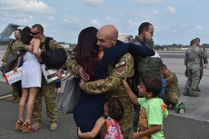 Tech. Sgt. Jedadiah Hutt, of the 14th Airlift Squadron,437th Airlift Wing, reunites with his wife, Michelle, and their children Dominic and Cali after returning home from a deployment in Southwest Asia Nov. 2, 2016, at Joint Base Charleston, South Carolina. Members of the 15th and 16th Airlift Squadrons had members return as well. The 437th AW commands the base's premier active-duty flying wing. The wing flies and maintains one of the largest fleets of C-17 aircraft in the Air Force, providing a significant portion of Air Mobility Command’s Global Reach airlift capability. 