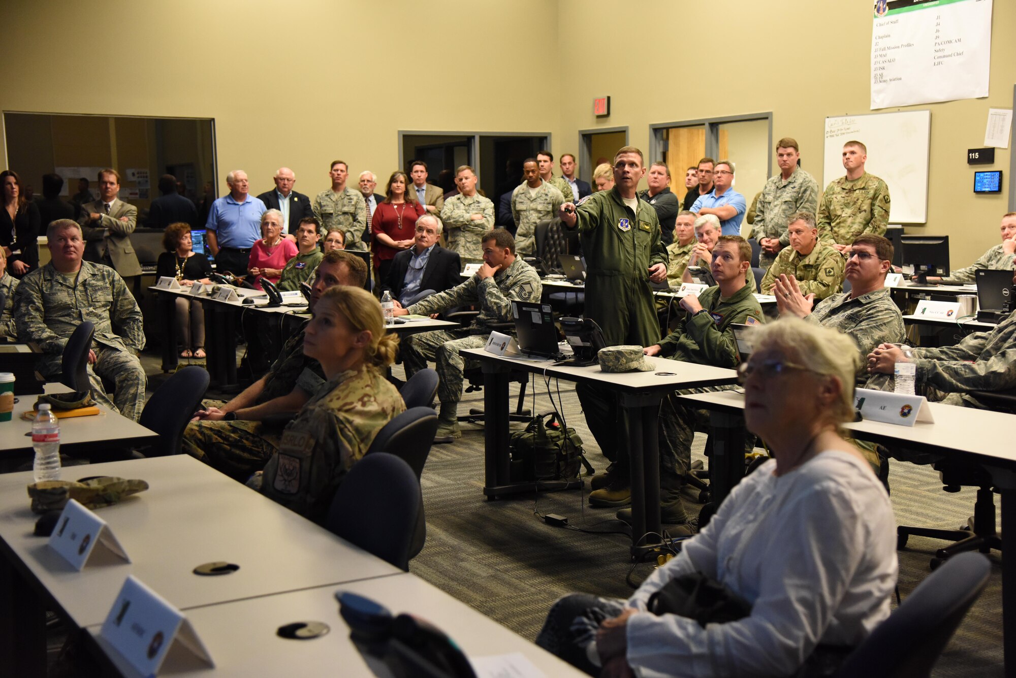 Lt. Col. Billy Murphy, Southern Strike 2017 exercise vice commander for air operations, delivers a brief during the Southern Strike Exercise Distinguished Visitor Day at the Combat Readiness Training Center, Gulfport, Miss., Nov. 3, 2016. Col. C. Mike Smith, 81st Training Wing vice commander, attended the event. Airmen from the 81st Medical Group participated Southern Strike which is a multi-service training exercise hosted by the Mississippi Air National Guard emphasizing air-to-air, air-to-ground and special operations forces training. (U.S. Air Force photo by Kemberly Groue/Released)