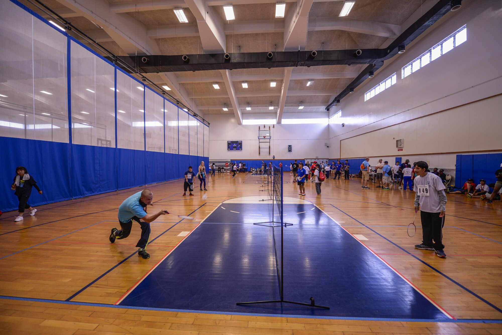 Kadena Special Olympic athletes and their athlete buddies compete in the badminton skills challenge Nov. 5, 2016, at Kadena Air Base, Japan. This event showcases a long-standing connection between our communities and thousands gather with the united goal of fostering friendships and building everlasting memories. (U.S. Air Force photo by Senior Airman Stephen G. Eigel/released)