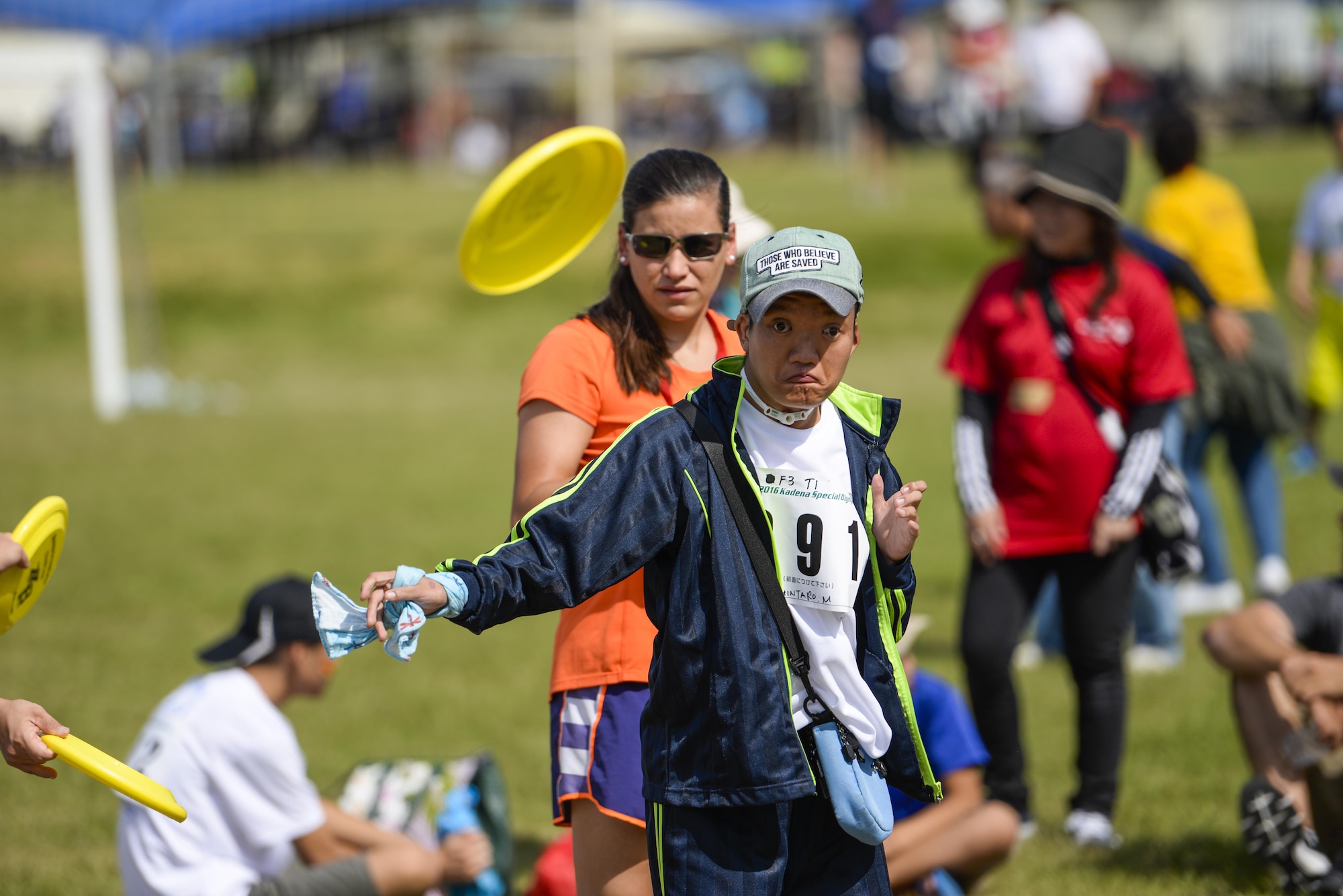 A Kadena Special Olympic athlete competes in the Frisbee toss challenge Nov. 5, 2016 during the Kadena Special Olympics, at Kadena Air Base, Japan. The KSO is sponsored by the 18th Wing and the Friends of Kadena Special Olympics in partnership with the Okinawa Prefectural Government, Okinawa City, Kadena Town, Chatan Town and all U.S. military services on island. (U.S. Air Force photo by Senior Airman Stephen G. Eigel/released)