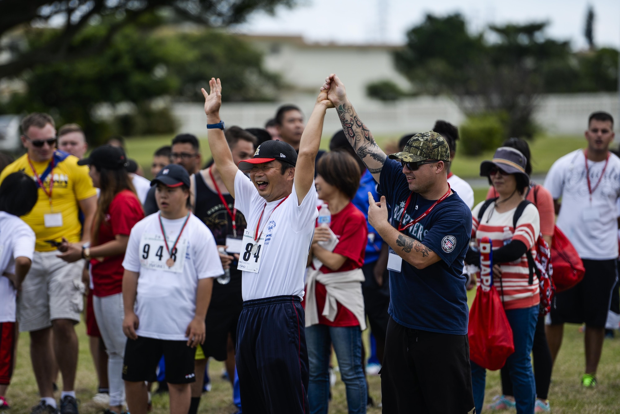 A Kadena Special Olympic athlete celebrates with his athlete buddy after scoring a goal during the soccer skills challenge Nov. 5, 2016 during the Kadena Special Olympics, at Kadena Air Base, Japan. The goal of the Kadena Special Olympics is to break down barriers and create an environment of understanding and acceptance. Since the first time we hosted these games in 2000, they have highlighted inspiring acts of kindness, courage and team spirit from the athletes, family members and volunteers across the island. (U.S. Air Force photo by Senior Airman Stephen G. Eigel/released)