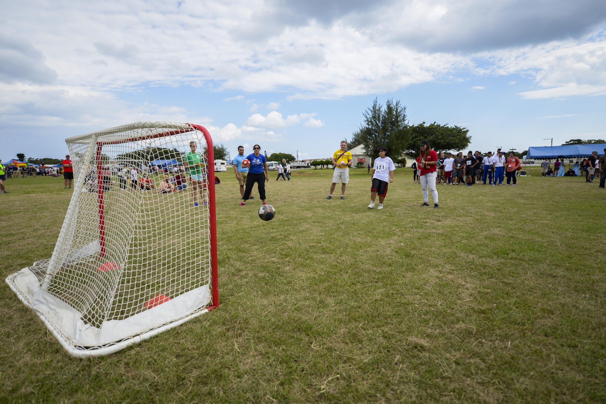 A Kadena Special Olympic athlete scores a goal during the soccer skills challenge Nov. 5, 2016 during the Kadena Special Olympics, at Kadena Air Base, Japan. Established by the 18th Wing commander in 2000, KSO is a sporting and entertainment event that provides an opportunity for all communities involved to stand together in support of people with special needs. (U.S. Air Force photo by Senior Airman Stephen G. Eigel/released)