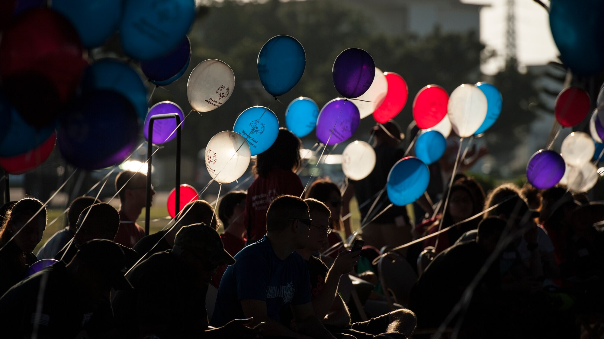 Brave Buddy volunteers wait for the arrival of athletes during the 2016 Kadena Special Olympics Nov. 5, 2016, at Kadena Air Base, Japan. Thousands of volunteers from various military bases and Okinawan community organizations gathered with the united goal of fostering friendships and building everlasting memories with special needs athletes. (U.S. Air Force photo by Senior Airman Peter Reft/Released)