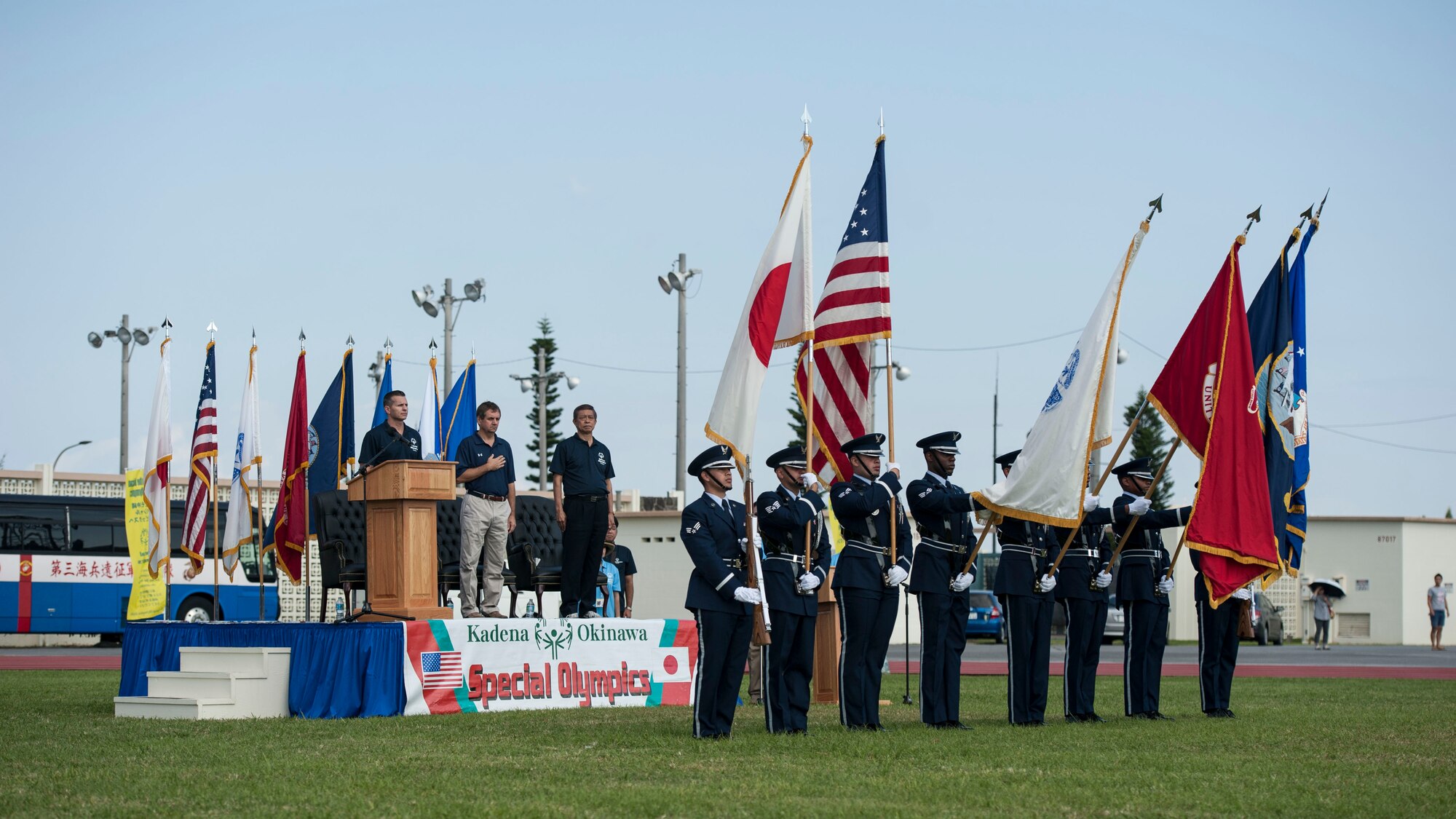 An 18th Wing Honor Guard detail begins the opening ceremony of the Kadena Special Olympics Nov. 5, 2016, at Kadena Air Base, Japan. U.S. Air Force Brig. Gen. Barry Cornish, 18th Wing commander, Joel Ehrendreich, U.S. Consul general, Naha, and Kiichiro Jahana, Director General of executive office of the Governor, greeted the crowd and shared their appreciation of all athletes, families and volunteers for making KSO a success. (U.S. Air Force photo by Senior Airman Peter Reft/Released)