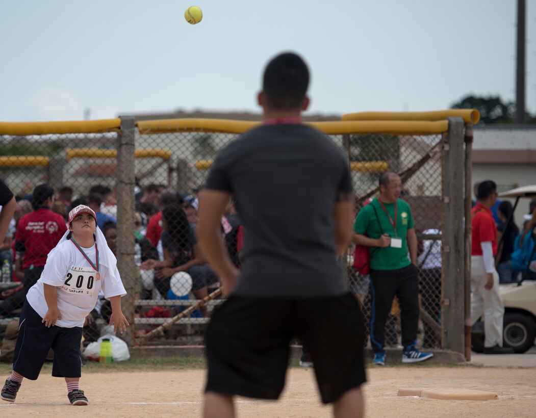 Sakura Sakihara, Kadena Special Olympics athlete, competes in the softball throw event during the Kadena Special Olymics Nov. 5, 2016 at Kadena Air Base, Japan. The KSO is the biggest overseas military Special Olympics event in the world and is a one-day sporting and outreach event that showcases the talents of nearly 1,300 local special needs athletes and artists. (U.S. Air Force photo by Senior Airman Omari Bernard/Released)