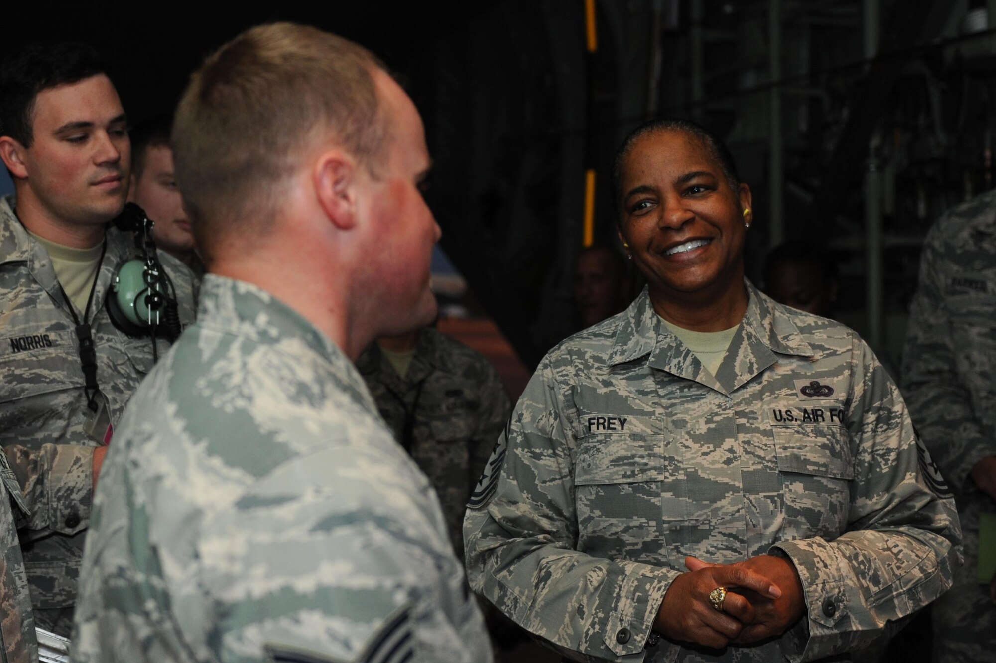 U.S. Air Force Chief Master Sgt. Shelina Frey, command chief for Air Mobility Command, engages with Airmen from the 19th Aircraft Maintenance Squadron during her tour of the base Nov. 1, 2016, at Little Rock Air Force Base, Ark. Airmen from units across the installation familiarized Frey with their unit’s missions during her visit.