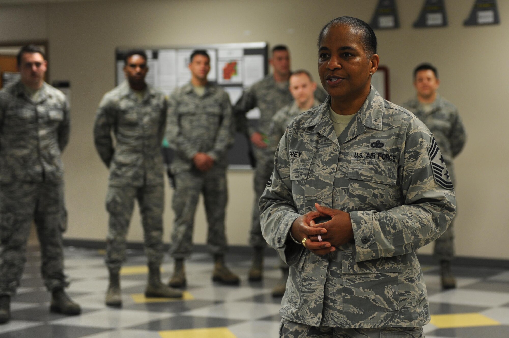 U.S. Air Force Chief Master Sgt. Shelina Frey, command chief for Air Mobility Command, engages with Airmen from the 19th Aircraft Maintenance Squadron during her tour of the base Nov. 1, 2016, at Little Rock Air Force Base, Ark. Airmen from units across the installation familiarized Frey with their unit’s missions during her visit.