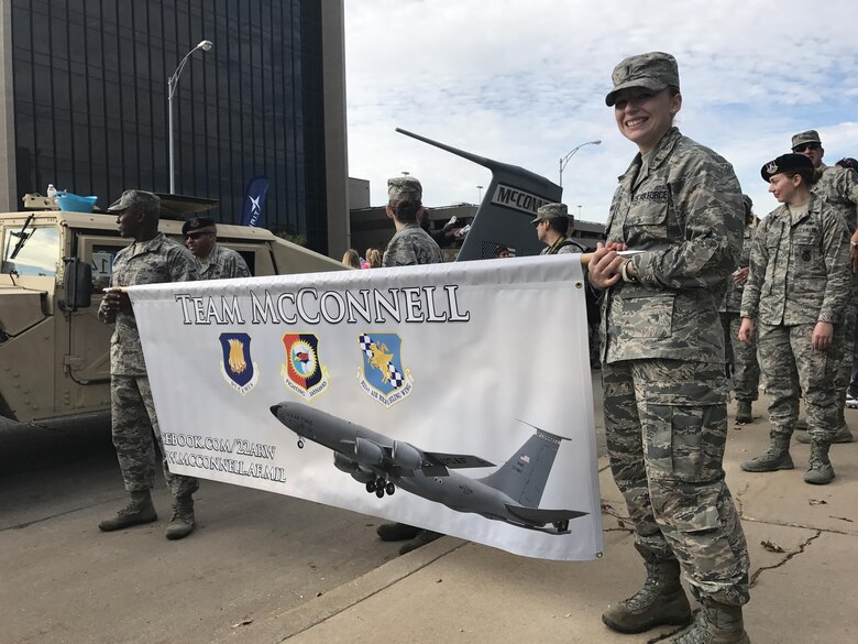 Members of Team McConnell participated in the 2016 Veterans Day Parade in downtown Wichita, Kansas, Nov. 5, 2015. The Total Force representation from the active duty 22nd Air Refueling Wing and the Reserve 931st Air Refueling Wing took part in the parade as a way to honor U.S. military veterans. (U.S. Air Force photo by Tech. Sgt. Abigail Klein)