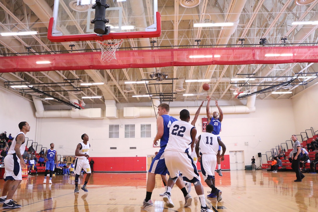 Senior Airman Jahmal Lawson (#20-Shooting) leads Air Force scoring 16-points and pulled down 18 rebounds against Navy. Navy defeated Air Force in the contest 70-64. The 2016 Armed Forces Men's Basketball Championship held at MCB Quantico, Va. from 1-7 November.  The best two teams during the doubel round robin will face each other for the 2016 Armed Forces crown.  