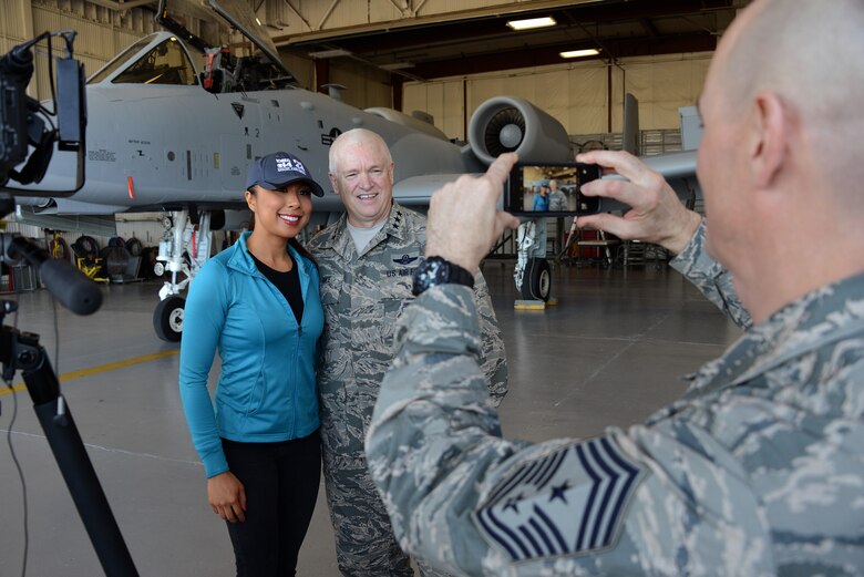 Air National Guard Director, Lt. Gen. Scott Rice and Ms. Jetske Wauran Journalist with KMEG TV pose, while Chief Master Sgt. Ron Anderson, Air National Guard Command Chief photographs them in front of a freshly painted U.S. Air Force A-10 Thunderbolt at the Air National Guard Paint Facility in Sioux City, Iowa on November 5, 2016. 
U.S. Air National Guard photo by Master Sgt. Vincent De Groot 185 ARW PA