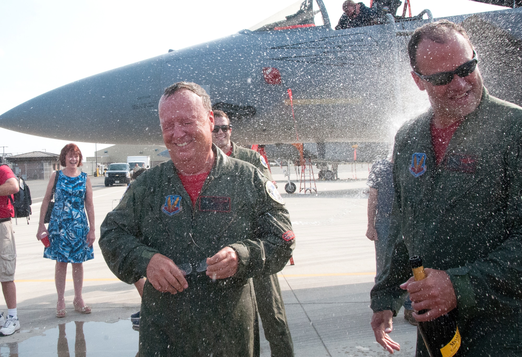 Lt. Col. Joe Monk Keenan, 104th Fighter Wing flight surgeon, and Lt. Col. Ken Hatman Fedora, 104th Fighter Wing F-15 pilot, celebrate the end of their military careers on Sept. 10, 2016, at Barnes Air National Guard Base, Westfield, Mass. (U.S. Air National Guard photo by 1st Lt. Bonnie Harper/released)