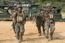 Marines with Bravo Company, 9th Engineering Support Battalion, 3d Marine Logistics Group, III Marine Expeditionary Force, carry a segment of a five-bay, double-story, medium-girder bridge during Blue Chromite 2017, Okinawa, Japan, November 2, 2016. Blue Chromite is a U.S. – only exercise which strengthens the Navy-Marine Corps expeditionary, amphibious rapid-response capabilities based in Okinawa and the greater Indo-Asia-Pacific region. (U.S. Marine Corps photo by MCIPAC Combat Camera Lance Cpl. Tiana Boyd)