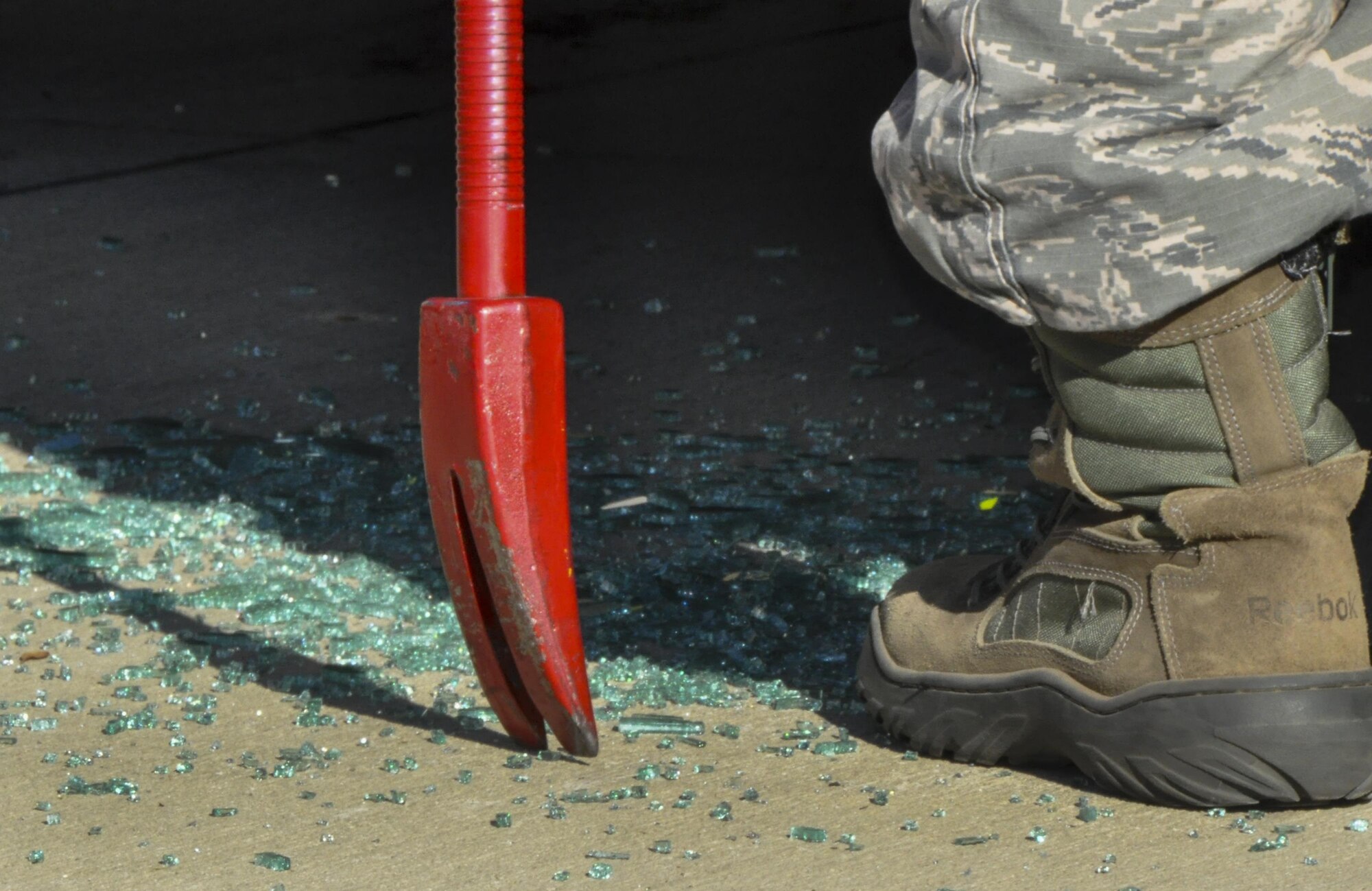 Shattered glass surrounds a car after 919th Special Operations Wing firefighters broke out the windows during an extraction training exercise at Duke Field, Fla., Nov. 6. The wing’s firefighters took part in the exercise to meet their bi-annual training requirement.  (U.S. Air Force photo/Dan Neely)